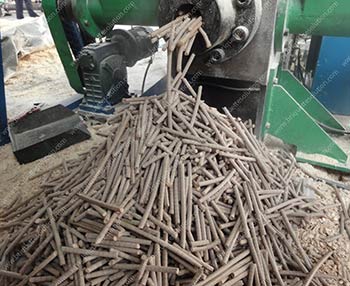 log briquette maker is making pellet