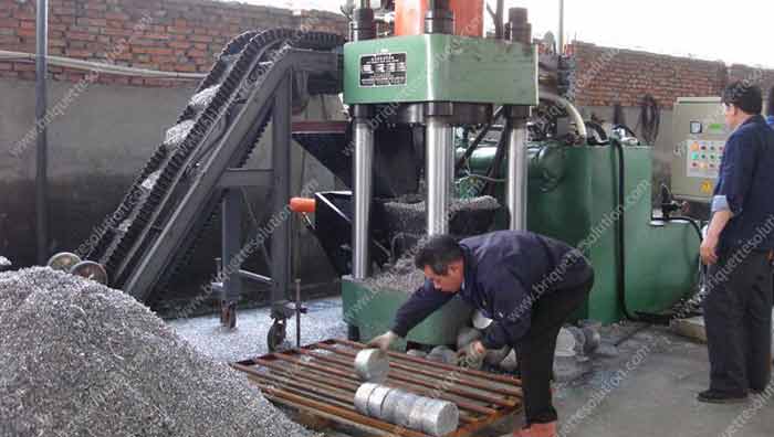 a running hydraulic briquette plant with aluminum scrap